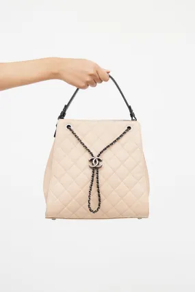 Beige & Black Caviar Quilted Bucket Bag